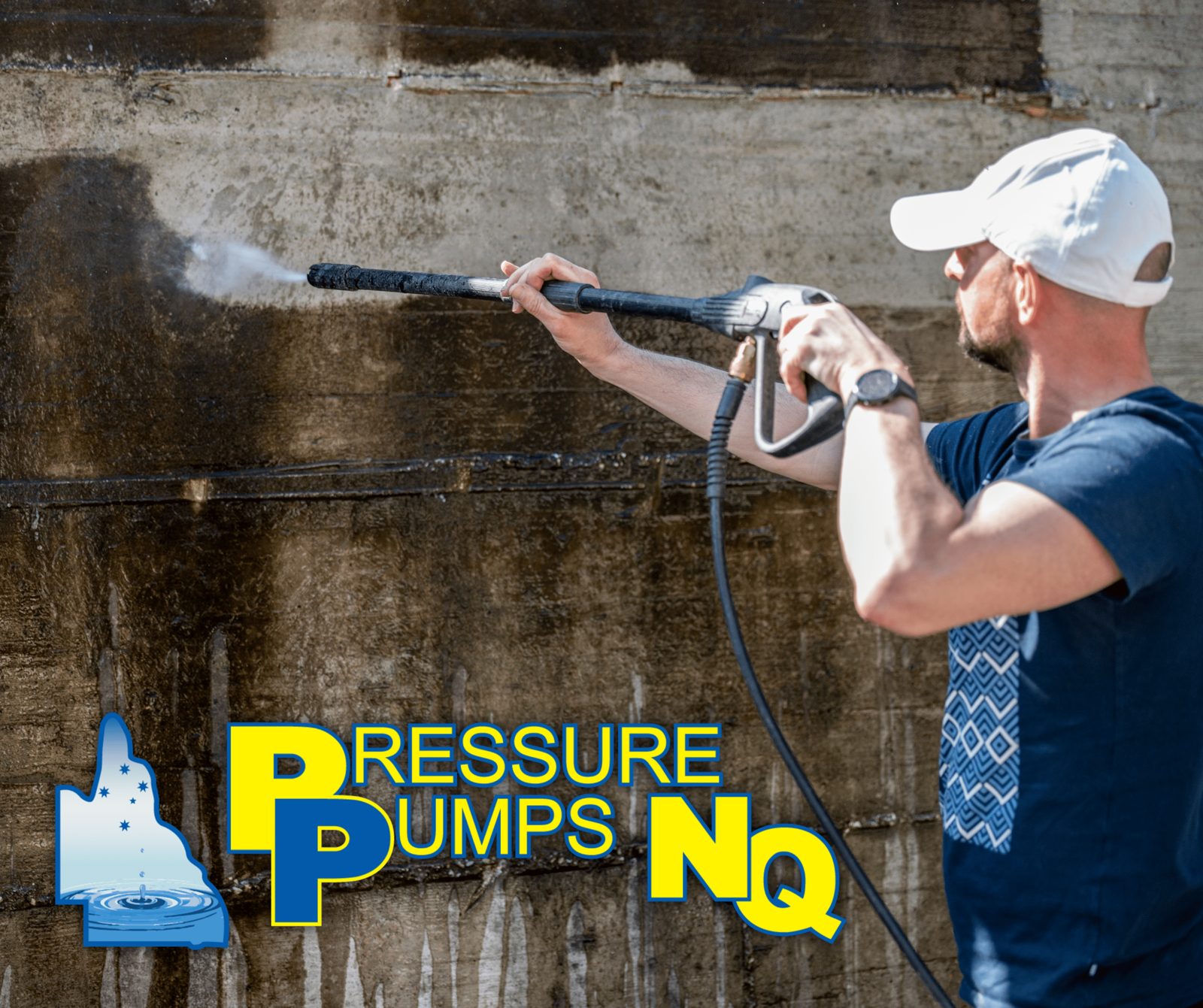 Man Washing Exterior Wall